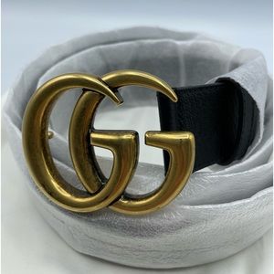 Gucci black belt with gold buckle. Excellent condition, rarely worn.